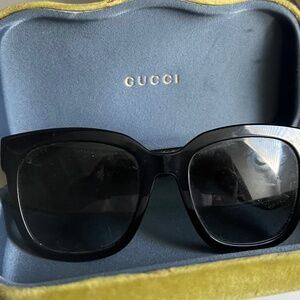 2 pair of Gucci Sunglasses one Sunglasses case